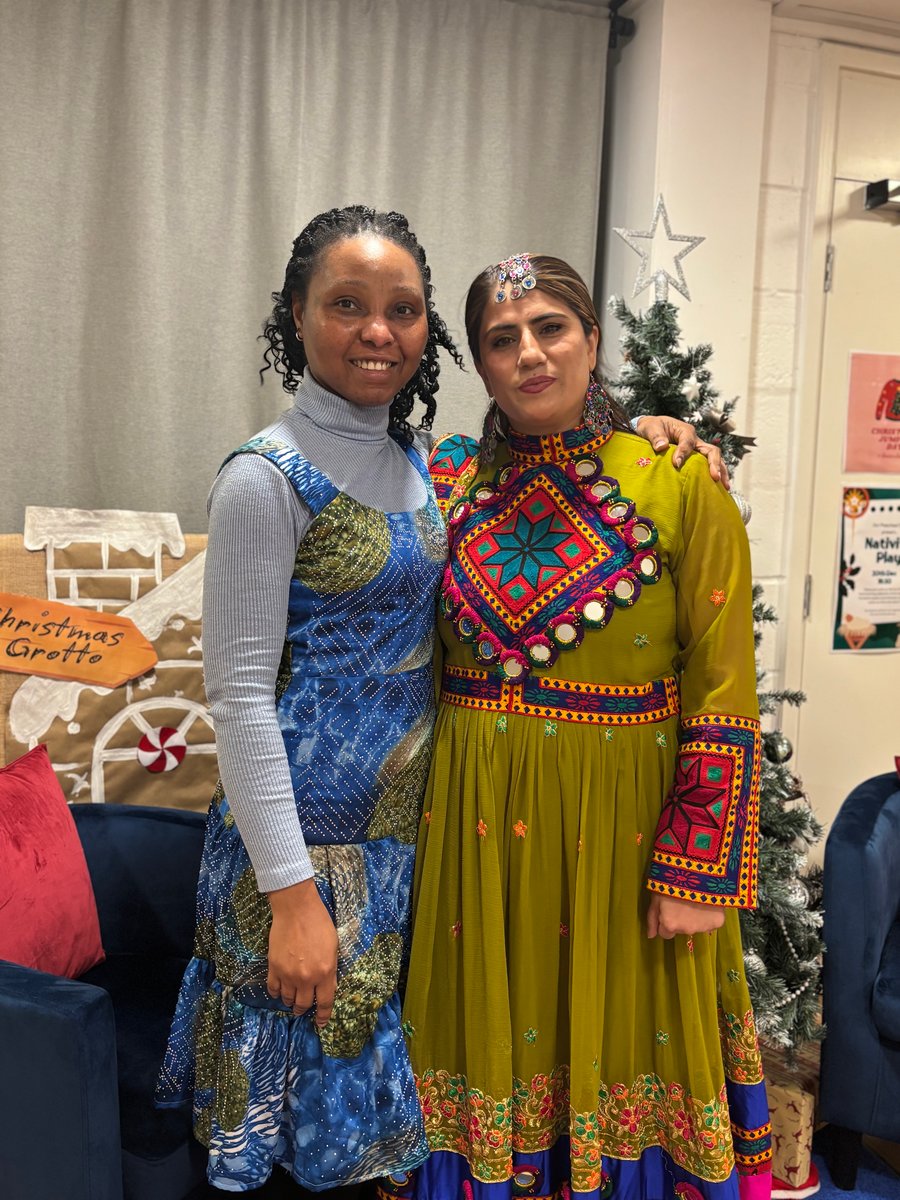 internationa migrants day - staff authentic - cultural outfits