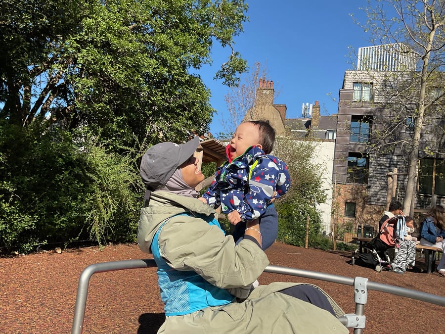 Baby smiling - park - April